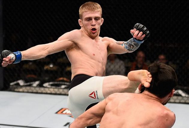 LAS VEGAS, NV - FEBRUARY 06: (L-R) Justin Scoggins kicks Ray Borg in their flyweight bout during the UFC Fight Night event at MGM Grand Garden Arena on February 6, 2016 in Las Vegas, Nevada. (Photo by Jeff Bottari/Zuffa LLC/Zuffa LLC via Getty Images)