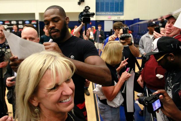 TLANTA, GA - APRIL 19: Jon Jones signs autographs for fans after working out for the media during UFC 145 open workouts at GSU Sports Arena on April 19, 2012 in Atlanta, Georgia. (Photo by Kevin C. Cox/Zuffa LLC/Zuffa LLC via Getty Images)