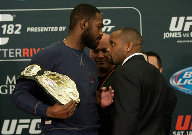 LAS VEGAS, NEVADA - JANUARY 01: (L-R) UFC light heavyweight champion Jon Jones and Daniel Cormier face off during the UFC 182 Media Day at the MGM Grand Hotel and Casino on January 1, 2015 in Las Vegas, Nevada. (Photo by Brandon Magnus/Zuffa LLC/Zuffa LLC via Getty Images)