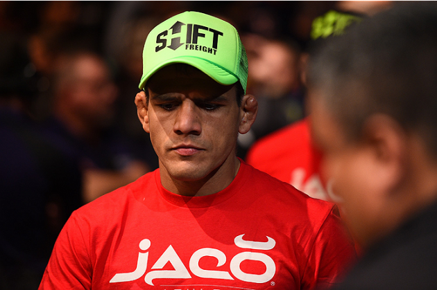 PHOENIX, AZ - DECEMBER 13: Rafael dos Anjos of Brazil enters the arena before facing Nate Diaz in their lightweight fight during the UFC Fight Night event at the U.S. Airways Center on December 13, 2014 in Phoenix, Arizona. (Photo by Josh Hedges/Zuffa LLC/Zuffa LLC via Getty Images)