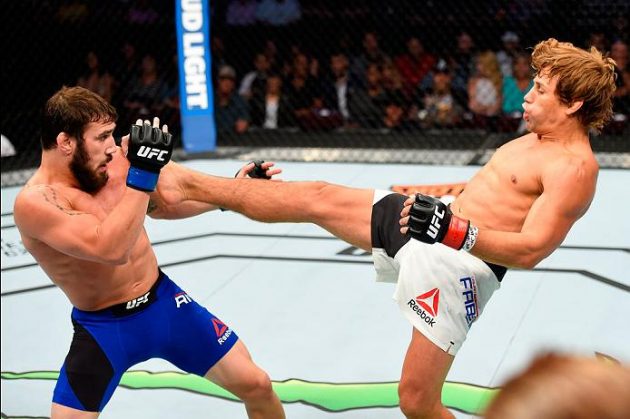 CLEVELAND, OH - SEPTEMBER 10: (R-L) Urijah Faber throws a kick towards the face of Jimmie Rivera in their bantamweight bout during the UFC 203 event at Quicken Loans Arena on September 10, 2016 in Cleveland, Ohio. (Photo by Josh Hedges/Zuffa LLC/Zuffa LLC via Getty Images)