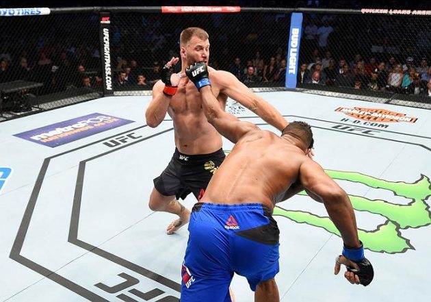 CLEVELAND, OH - SEPTEMBER 10: (R-L) Alistair Overeem of The Netherlands punches Stipe Miocic in their UFC heavyweight championship bout during the UFC 203 event at Quicken Loans Arena on September 10, 2016 in Cleveland, Ohio. (Photo by Josh Hedges/Zuffa LLC/Zuffa LLC via Getty Images)