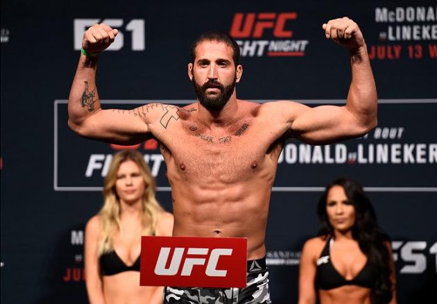 SIOUX FALLS, SD - JULY 12: Alex Nicholson steps onto the scale during the UFC Fight Night weigh-in at Denny Sanford Premier Center on July 12, 2016 in Sioux Falls, South Dakota. (Photo by Jeff Bottari/Zuffa LLC/Zuffa LLC via Getty Images)