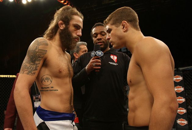 LAS VEGAS, NV - JUNE 01: (L-R) Michael Chiesa and Al Iaquinta face off before their Lightweight bout during The Ultimate Fighter Live Finale at the Pearl Theater at the Palms Casino Resort on June 1, 2012 in Las Vegas, Nevada. (Photo by Josh Hedges/Zuffa LLC/Zuffa LLC via Getty Images) *** Local Caption *** Al Iaquinta; Michael Chiesa