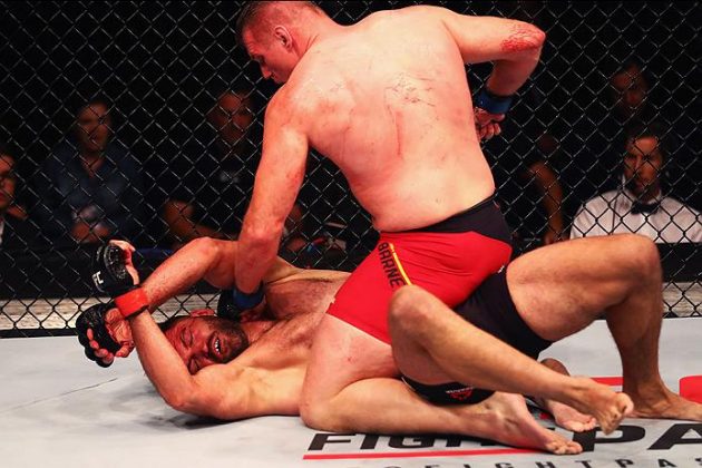 HAMBURG, GERMANY - SEPTEMBER 03: Josh Barnett (top) of USA controls the body of Andrei Arlovski (L) of Belarus compete in their Heavyweight Bout during the UFC Fight Night held at Barclaycard Arena at Barclaycard Arena on September 3, 2016 in Hamburg, Germany. (Photo by Dean Mouhtaropoulos/Zuffa LLC/Zuffa LLC via Getty Images)