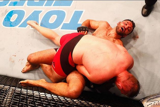 HAMBURG, GERMANY - SEPTEMBER 03: Josh Barnett (top) of USA controls the body of Andrei Arlovski of Belarus compete in their Heavyweight Bout during the UFC Fight Night held at Barclaycard Arena at Barclaycard Arena on September 3, 2016 in Hamburg, Germany. (Photo by Dean Mouhtaropoulos/Zuffa LLC/Zuffa LLC via Getty Images)