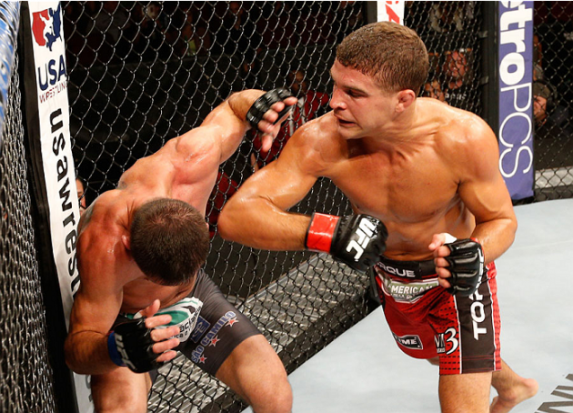 MASHANTUCKET, CT - SEPTEMBER 05: (R-L) Al Iaquinta elbows Rodrigo Damm of Brazil in their lightweight bout during the UFC Fight Night event at Foxwoods Resort Casino on September 5, 2014 in Mashantucket, Connecticut. (Photo by Josh Hedges/Zuffa LLC/Zuffa LLC via Getty Images)